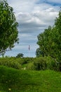 Row of trees full of ripe fruits in apple orchard and flag of USA Upstate New York Royalty Free Stock Photo