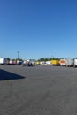 Row of trucks parked at a truck stop on the thruway rest stop Royalty Free Stock Photo