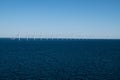 Row of wind turbines in Baltic Sea between Germany and Denmark Royalty Free Stock Photo