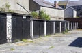 A row of typical lock up rental garages with flat roofs in poor repair in Bangor County Down Northern Ireland Royalty Free Stock Photo