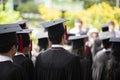 Row of university graduates