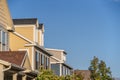 Row of upper floor facades of urban homes