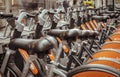 Row of Urban electric bikes charging batteries in the city of london for transportation to work and travel Royalty Free Stock Photo