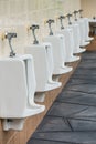 Row of urinals Public