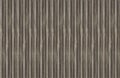 Row of vertical beige wooden lines of ribs set of boards narrow infinite repeating natural background