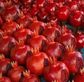Row of Vibrant Red Wooden Pomegranates for Sale at the Vernissage Market in Yerevan, Armenia Royalty Free Stock Photo