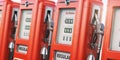 Row of vintage fuel pumps on gas pump station