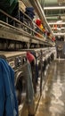 Row of Washers and Dryers in a Laundry Room