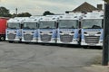 Row of white and blue electric wagons