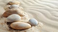A row of white and brown rocks on a sandy beach Royalty Free Stock Photo