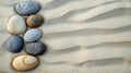 A row of white and brown rocks on a sandy beach Royalty Free Stock Photo