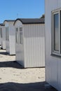 Row of white cabins on the Lokken beach, Denmark