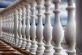 A row of white concrete balusters on the waterfront close-up. Royalty Free Stock Photo