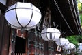 Row of white lantern in traditional old religious japan temple in Kyoto