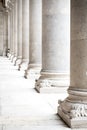 Row of white marble columns. Vertical image Royalty Free Stock Photo