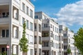 Row of white modern apartment houses seen in Berlin