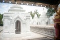 Row of white pagodas in Kuthodaw temple,Myanmar. Royalty Free Stock Photo