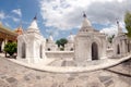 Row of white pagodas in Kuthodaw temple,Myanmar. Royalty Free Stock Photo