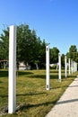 Row of white vinyl posts for backyard fence