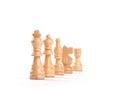 Row of white wooden chess pieces isolated on white background Royalty Free Stock Photo