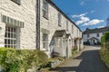 A row of whitewashed cottages in Ambleside, the English Lake Dis Royalty Free Stock Photo