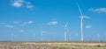 Wind turbines farm on cotton field at Corpus Christi, Texas, USA Royalty Free Stock Photo