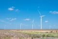 Wind turbines farm on cotton field at Corpus Christi, Texas, USA Royalty Free Stock Photo