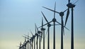 Row of windmills at dawn