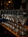 Row of wine glasses lined up on a table Royalty Free Stock Photo