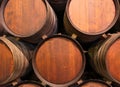 Row of wooden barrels of tawny portwine in cellar, Porto, Portugal Royalty Free Stock Photo