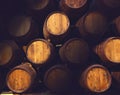 Row of wooden barrels of tawny portwine ( port wine ) in cellar, Porto, Portugal Royalty Free Stock Photo