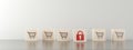 Row of wooden blocks with shopping cart icons and lock icon on top, secure, safe online shopping concept, selective focus Royalty Free Stock Photo