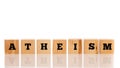 Row of wooden blocks spelling - Atheism