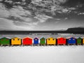 The row of wooden brightly colored huts.