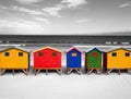 The row of wooden brightly colored huts. Royalty Free Stock Photo