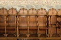 Row of wooden chairs in an orthodox church Royalty Free Stock Photo