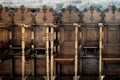 Row of wooden chairs in an orthodox church Royalty Free Stock Photo