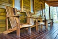 Row of wooden chairs on terrace Royalty Free Stock Photo