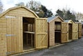 A Row of Wooden Garden Sheds In Surrey UK