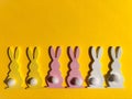 Wooden toy flatlay, colorful rabbits