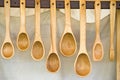 Row of wooden spoons Royalty Free Stock Photo