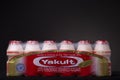 Row of Yakult health drink in package