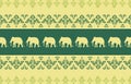 Row of yellow elephants silhouetted against a dark green background with decorative borders Royalty Free Stock Photo