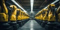 A row of yellow robots in a factory. Generative AI image. Royalty Free Stock Photo