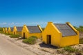 Row of yellow slave houses on Bonaire Royalty Free Stock Photo