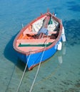 Rowboat in clear sea.