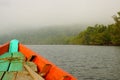 Rowboat in early morning mist Royalty Free Stock Photo