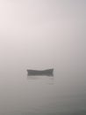 Rowboat in fog Royalty Free Stock Photo