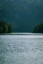 Rowboat isolated in the mysterious and majestic Black Lake, Durmitor National Park, Zabljak, Montenegro.