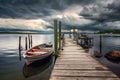 rowboats on a dock under dramatic stormy skies Royalty Free Stock Photo